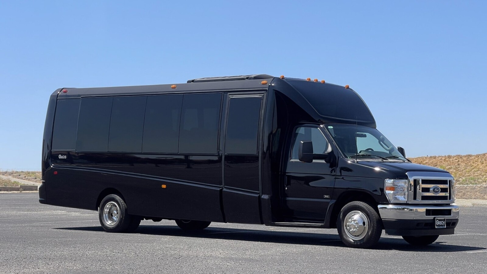 2025 GM28 Ford E450 22 Passenger (Black or White)